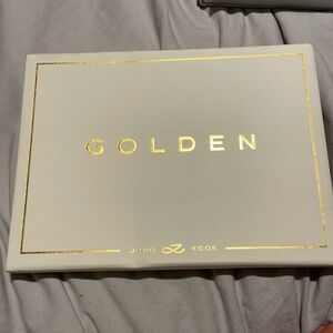 It’s JungKooks Golden album, white.